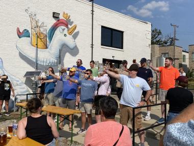 men compete in stein holding competition at soul &amp; spirits