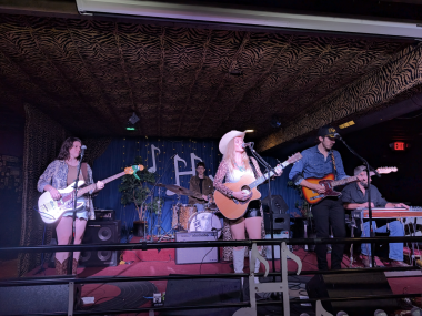 band performs on stage at Hernando's Hideaway