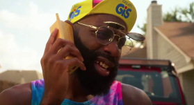 tyke t holding phone up to his ear