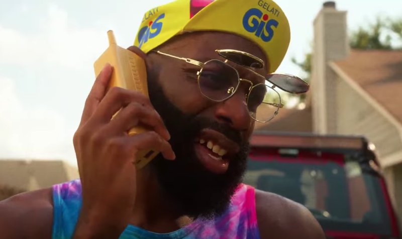 tyke t holding phone up to his ear